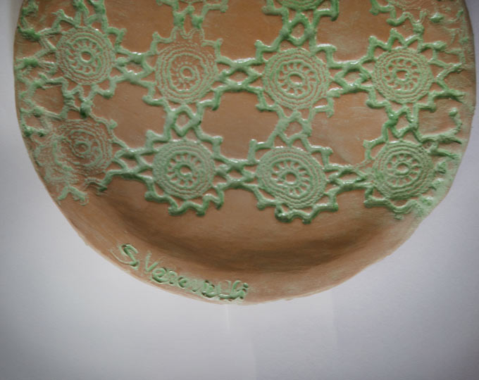 red-clay-plate-with-colored-lace C
